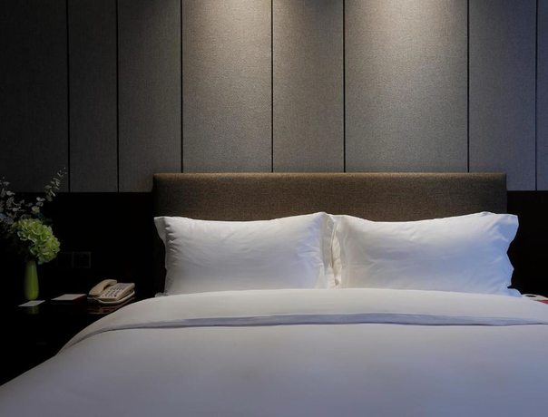 Imagen de la habitación del Hotel Ramada by Wyndham Huizhou South. Foto 17