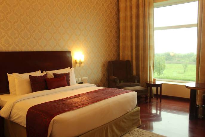 Imagen de la habitación del Hotel Ramada by Wyndham Jaipur Jaisinghpura. Foto 4