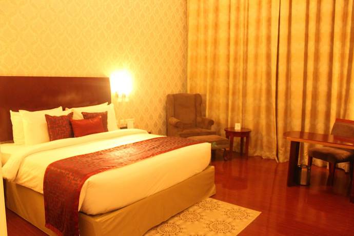 Imagen de la habitación del Hotel Ramada by Wyndham Jaipur Jaisinghpura. Foto 10