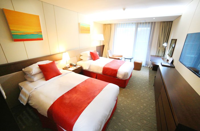 Imagen de la habitación del Hotel Ramada by Wyndham Jeju Hamdeok. Foto 2