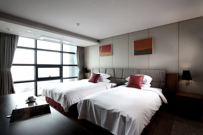 Imagen de la habitación del Hotel Ramada by Wyndham Jeju Hamdeok. Foto 6