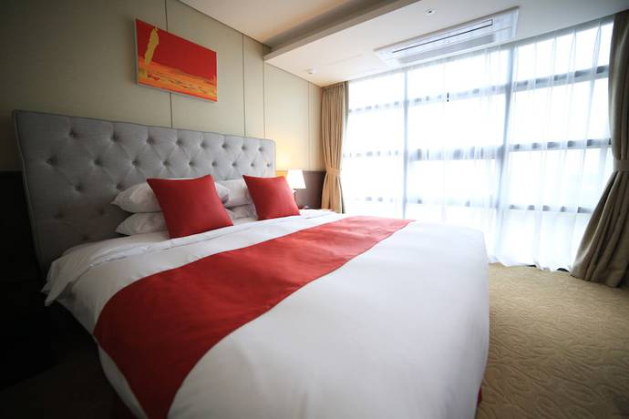 Imagen de la habitación del Hotel Ramada by Wyndham Jeju Hamdeok. Foto 8