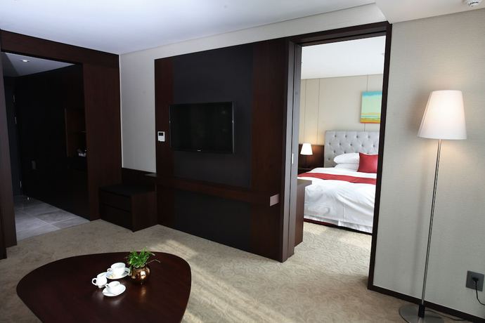 Imagen de la habitación del Hotel Ramada by Wyndham Jeju Hamdeok. Foto 12