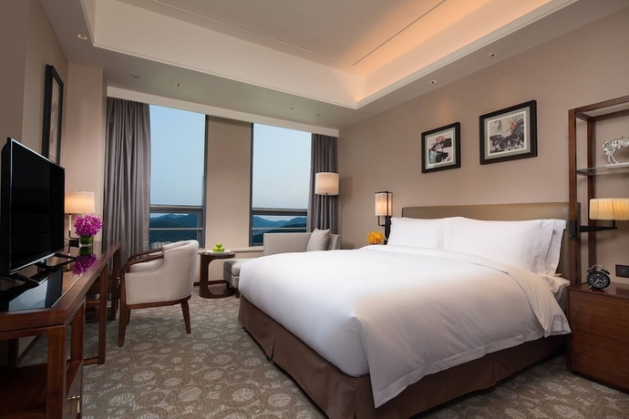 Imagen de la habitación del Hotel Ramada by Wyndham Jinan. Foto 7