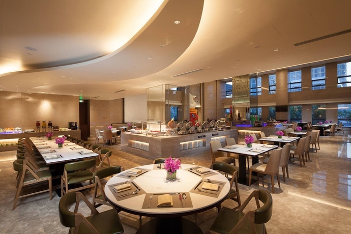 Imagen del bar/restaurante del Hotel Ramada by Wyndham Jinan. Foto 4