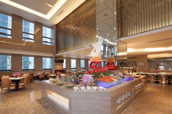Imagen del bar/restaurante del Hotel Ramada by Wyndham Jinan. Foto 6