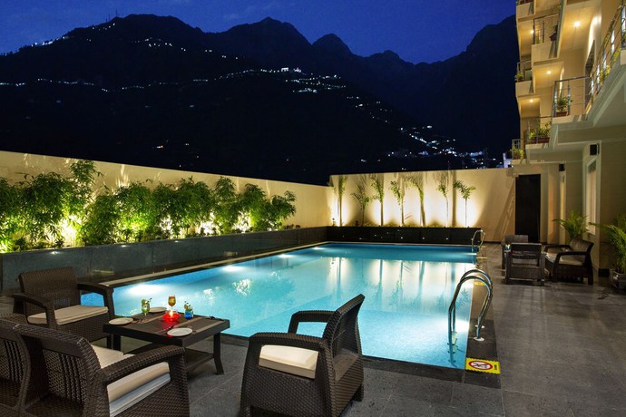 Imagen de la piscina del Hotel Ramada by Wyndham Katra Station Road. Foto 18