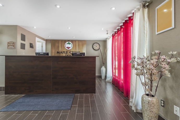 Imagen de los interiores del Hotel Ramada by Wyndham Kingston. Foto 17