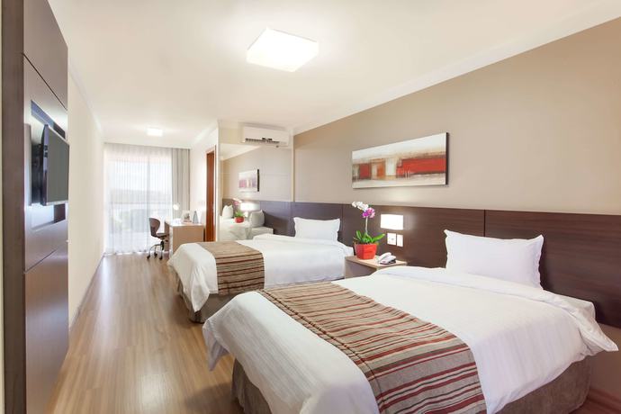 Imagen de la habitación del Hotel Ramada by Wyndham Lagoa Santa INTL Airport Belo Horizonte. Foto 1
