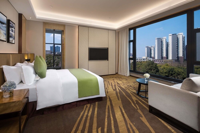 Imagen de la habitación del Hotel Ramada by Wyndham Leshan. Foto 5