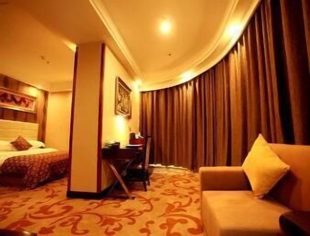 Imagen de la habitación del Hotel Ramada by Wyndham Linyi North. Foto 8