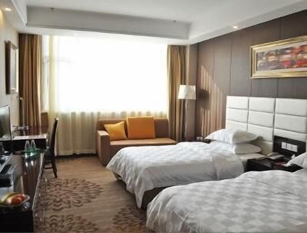 Imagen de la habitación del Hotel Ramada by Wyndham Linyi North. Foto 10