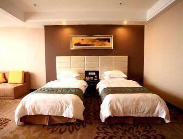 Imagen de la habitación del Hotel Ramada by Wyndham Linyi North. Foto 11