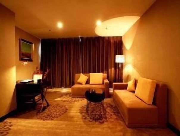 Imagen de la habitación del Hotel Ramada by Wyndham Linyi North. Foto 12