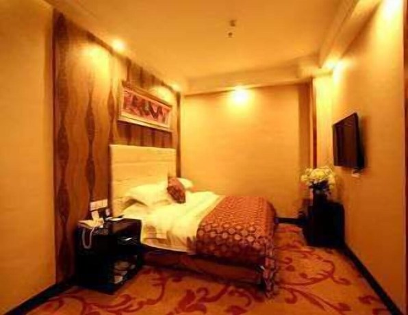 Imagen de la habitación del Hotel Ramada by Wyndham Linyi North. Foto 13