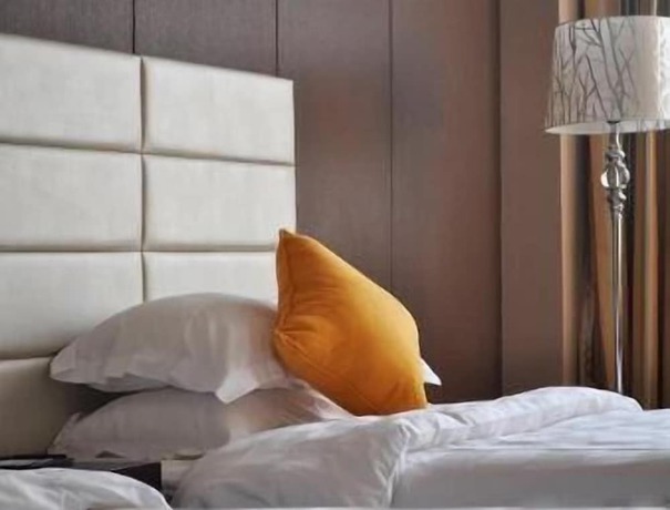 Imagen de la habitación del Hotel Ramada by Wyndham Linyi North. Foto 16