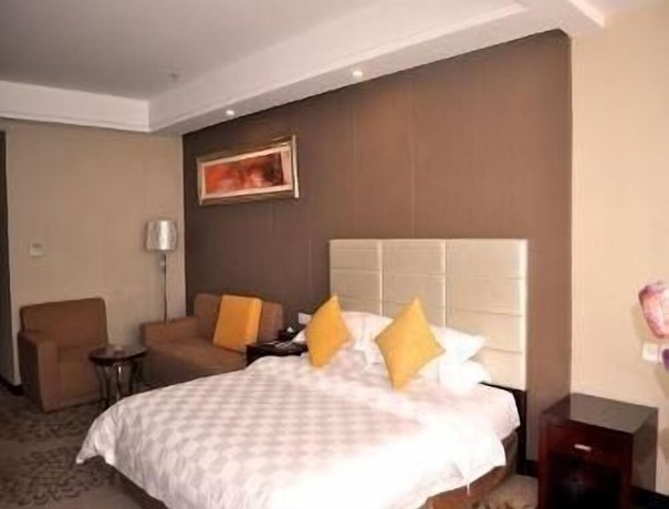 Imagen de la habitación del Hotel Ramada by Wyndham Linyi North. Foto 17