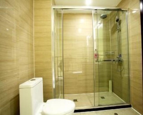 Imagen de la habitación del Hotel Ramada by Wyndham Linyi North. Foto 18
