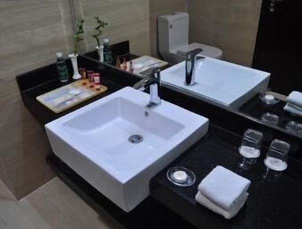 Imagen de la habitación del Hotel Ramada by Wyndham Linyi North. Foto 19
