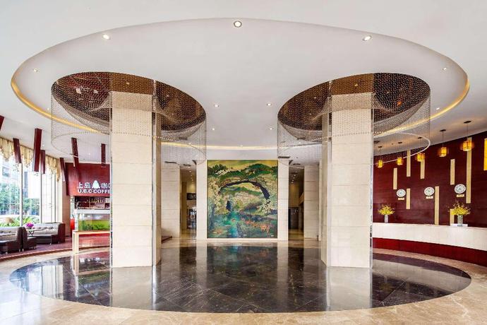 Imagen de los interiores del Hotel Ramada by Wyndham Liuzhou Luzhai. Foto 12