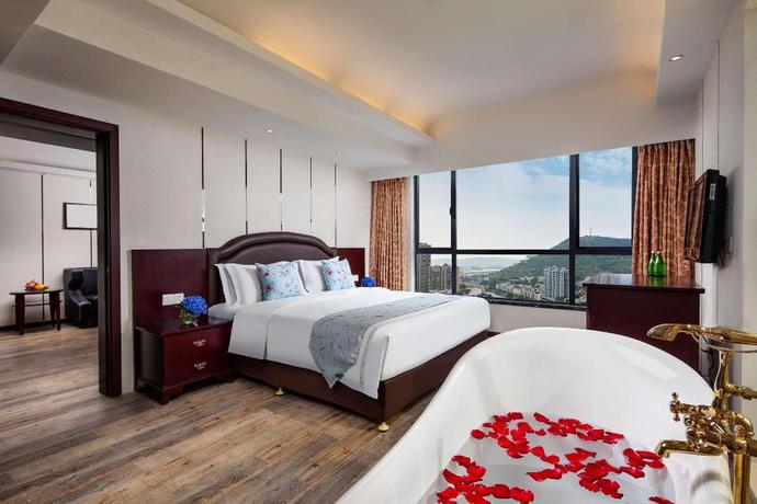 Imagen de la habitación del Hotel Ramada by Wyndham Liuzhou Luzhai. Foto 3