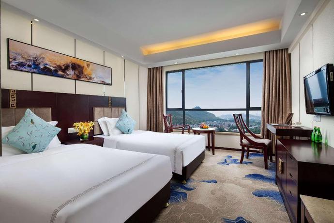 Imagen de la habitación del Hotel Ramada by Wyndham Liuzhou Luzhai. Foto 5