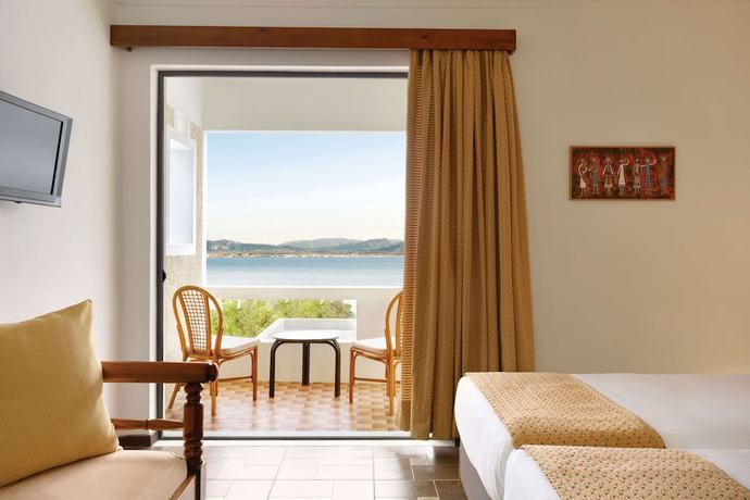 Imagen de la habitación del Hotel Ramada by Wyndham Loutraki Poseidon Resort. Foto 10