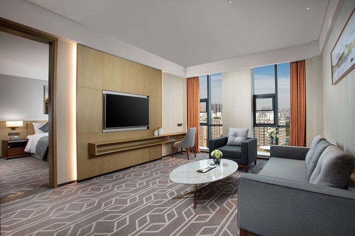 Imagen de la habitación del Hotel Ramada by Wyndham Luoyang Downtown. Foto 6