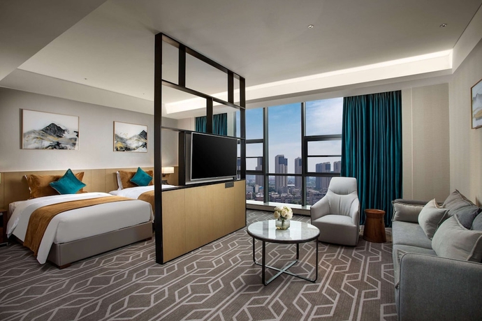 Imagen de la habitación del Hotel Ramada by Wyndham Luoyang Downtown. Foto 8