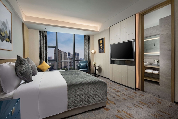 Imagen de la habitación del Hotel Ramada by Wyndham Luoyang Downtown. Foto 9