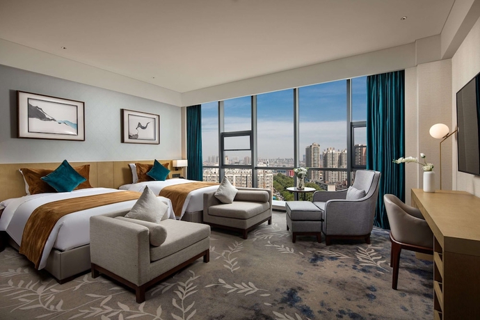Imagen de la habitación del Hotel Ramada by Wyndham Luoyang Downtown. Foto 10