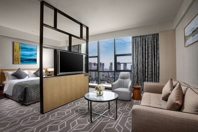 Imagen de la habitación del Hotel Ramada by Wyndham Luoyang Downtown. Foto 12