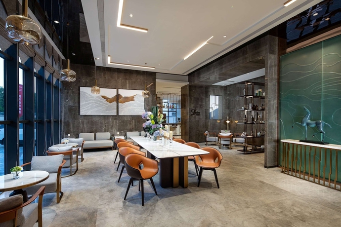 Imagen del bar/restaurante del Hotel Ramada by Wyndham Luoyang Downtown. Foto 3