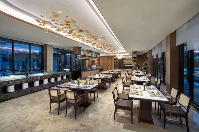 Imagen del bar/restaurante del Hotel Ramada by Wyndham Luoyang Downtown. Foto 4