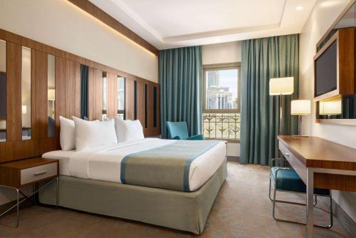 Imagen de la habitación del Hotel Ramada by Wyndham Makkah Zad Al Tayseer. Foto 12