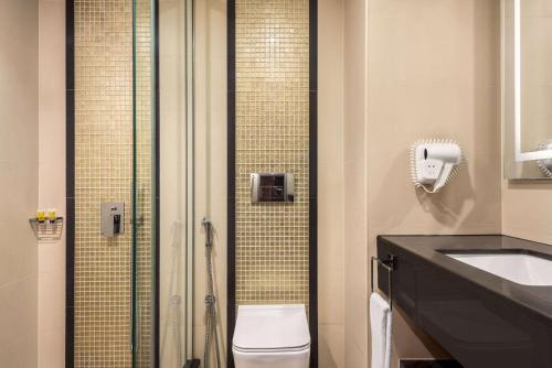 Imagen de la habitación del Hotel Ramada by Wyndham Makkah Zad Al Tayseer. Foto 13