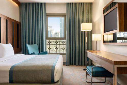 Imagen de la habitación del Hotel Ramada by Wyndham Makkah Zad Al Tayseer. Foto 15