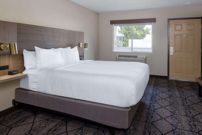 Imagen de la habitación del Hotel Ramada by Wyndham Modesto Yosemite Area. Foto 7