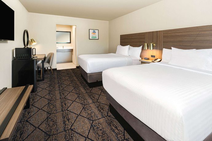 Imagen de la habitación del Hotel Ramada by Wyndham Modesto Yosemite Area. Foto 8