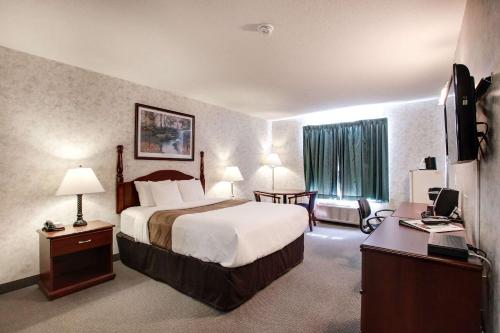 Imagen de la habitación del Hotel Ramada by Wyndham Nisku Edmonton Airport. Foto 7