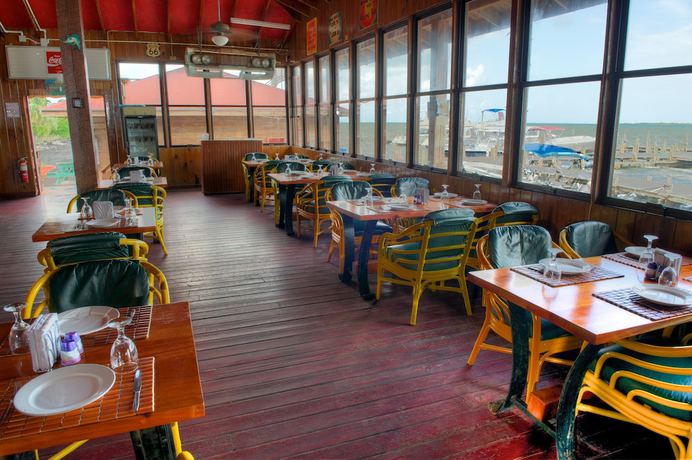 Imagen del bar/restaurante del Hotel Ramada by Wyndham Princess Belize City. Foto 3