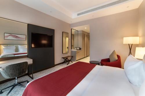 Imagen de la habitación del Hotel Ramada by Wyndham Riyadh King Fahd Road. Foto 9
