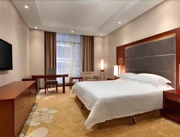 Imagen de la habitación del Hotel Ramada by Wyndham Shanghai Minhang. Foto 8