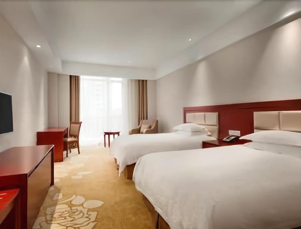 Imagen del bar/restaurante del Hotel Ramada by Wyndham Shanghai Minhang. Foto 3