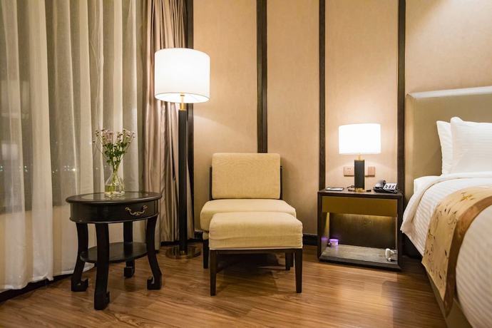 Imagen de la habitación del Hotel Ramada by Wyndham Shanghai Songjiang. Foto 9