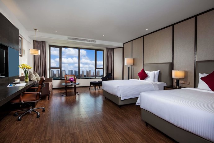 Imagen de la habitación del Hotel Ramada by Wyndham Shanghai Songjiang. Foto 11