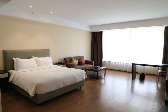 Imagen de la habitación del Hotel Ramada by Wyndham Shanghai Songjiang. Foto 12