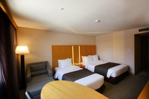 Imagen de la habitación del Hotel Ramada by Wyndham Songdo. Foto 6