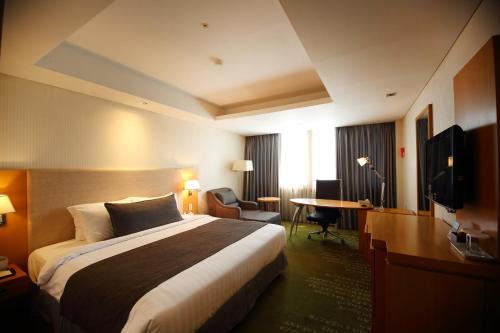 Imagen de la habitación del Hotel Ramada by Wyndham Songdo. Foto 7