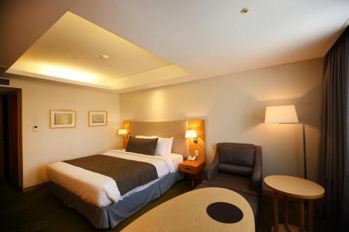 Imagen de la habitación del Hotel Ramada by Wyndham Songdo. Foto 8